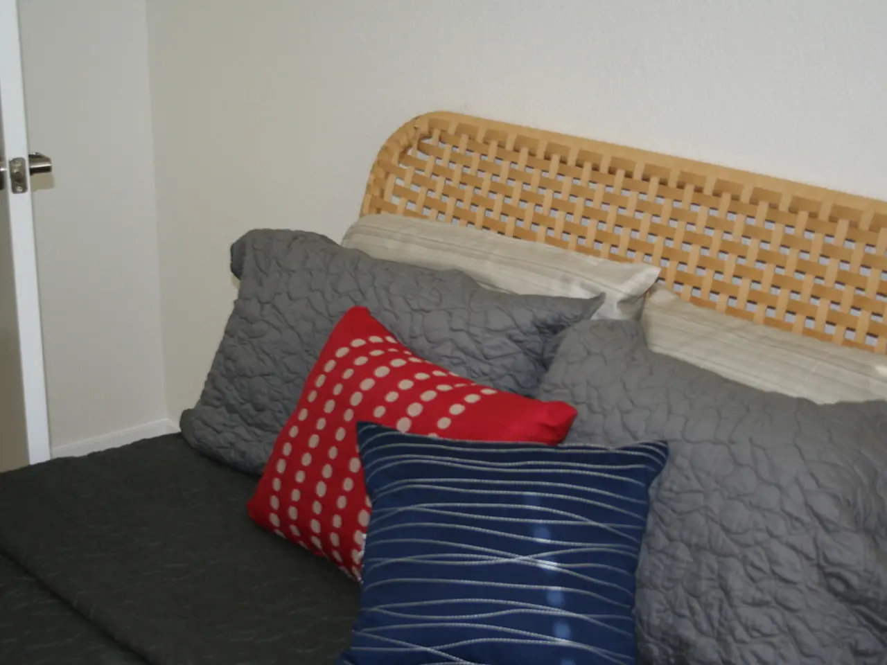 The triumph of a calming bedroom hue is contingent upon its application, as demonstrated in...